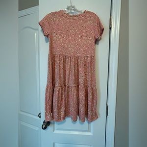 Jessica Simpson dress with peach-colored and yellow tones.